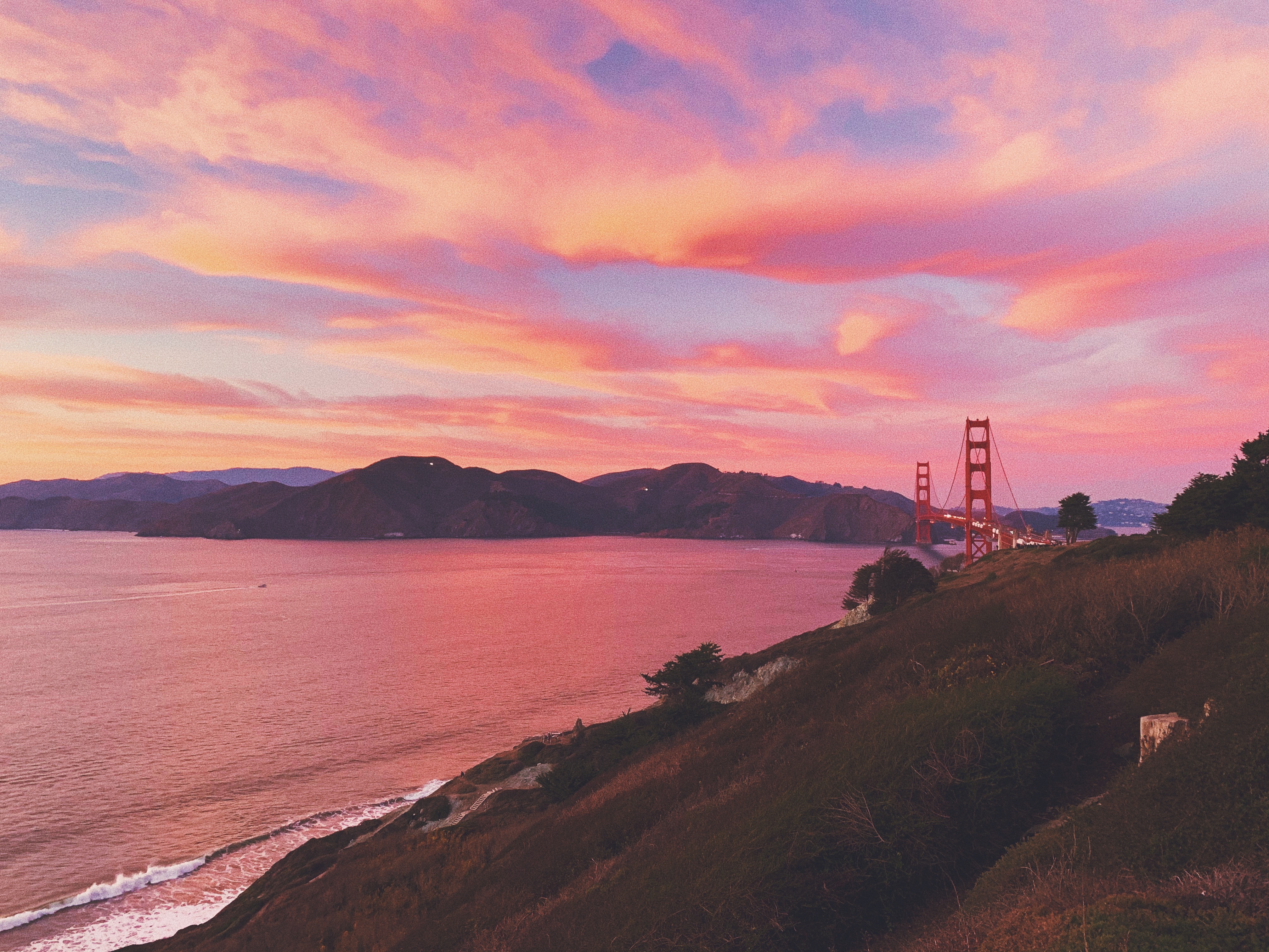 San Francisco’s Golden Gate Bridge at sunset facing Sausalito.