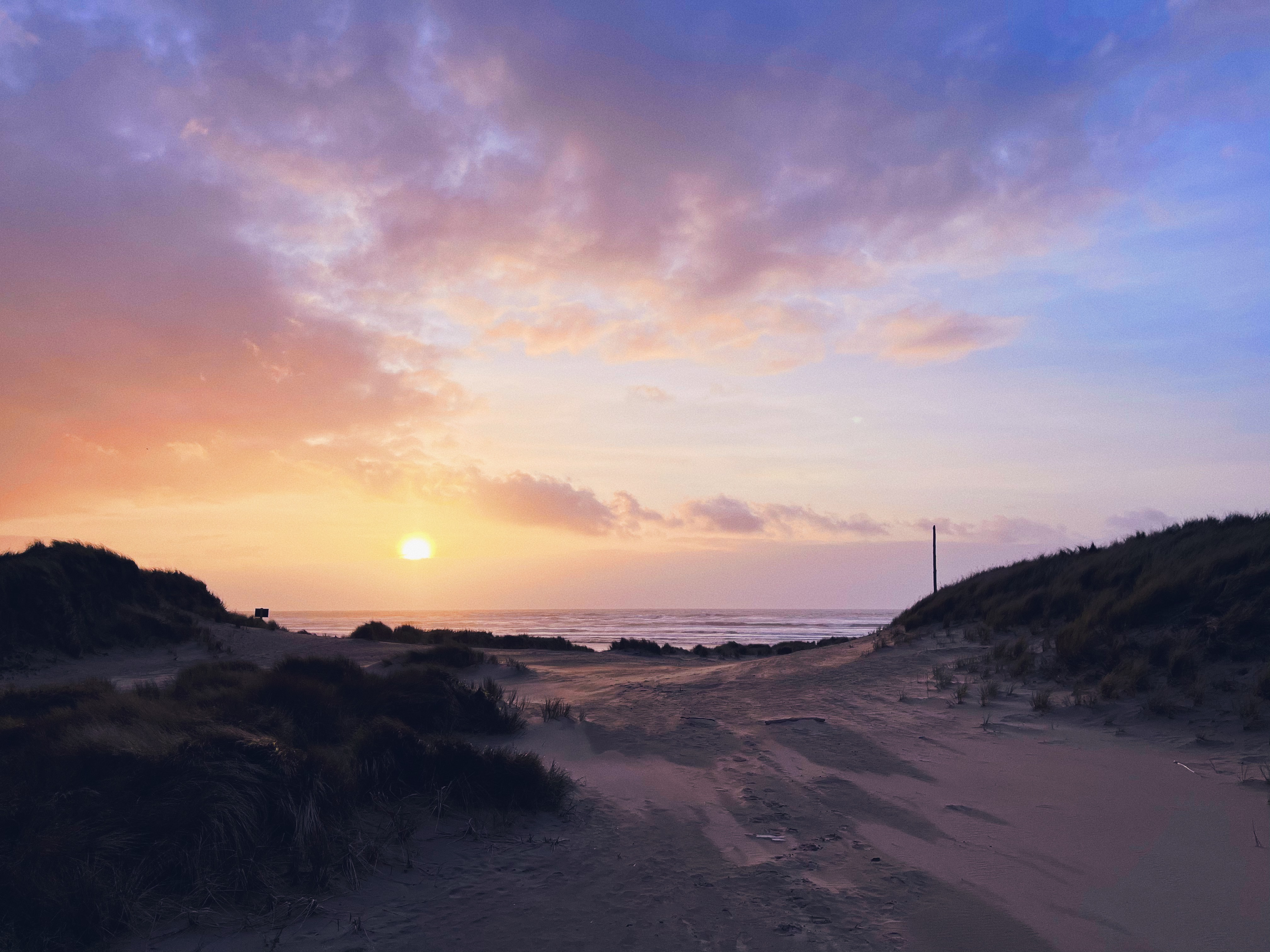 Sunset over a beach in Waldport, Oregon.
